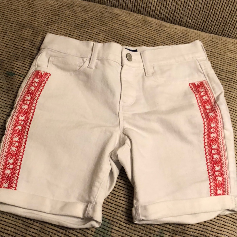 White shorts with red design on side